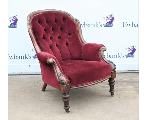 Victorian button back armchair with carved mahogany showframe on turned front supports