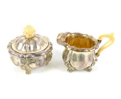 Late 19th/ early 20th century German planished silver  cream jug and sugar bowl with ivory handles, by Deppenbrock marked 800