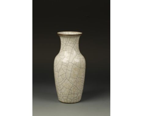 A CHINESE GEYAO BALUSTER VASE, the light greyish glaze with dark and lighter crackles, the base with a Chenghua seal mark, Qi