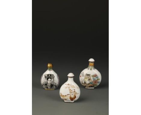 THREE CHINESE ENAMELLED METAL SNUFF BOTTLES of rounded form, one showing cats amongst flowers with an inscription and seal, a