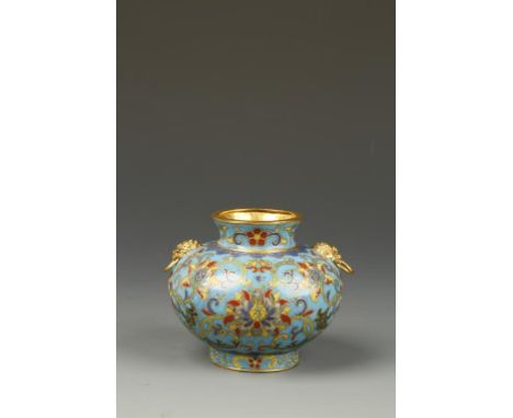 A CHINESE CLOISONNÉ MINIATURE VASE of rounded form with a flared neck, lion-mask handles and a straight foot, decorated in po