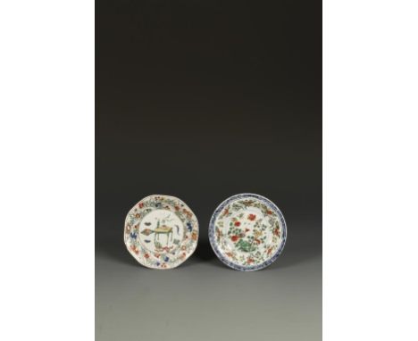 TWO CHINESE FAMILLE VERTE SAUCERS, one of octagonal form decorated with precious objects on a table within a foliate border, 