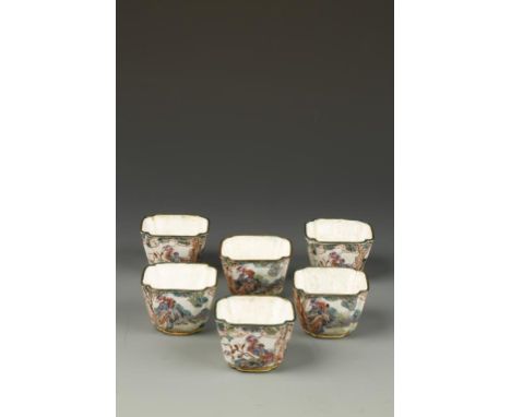 A SET OF SIX CHINESE CANTON ENAMEL WINE CUPS of tapering quatrefoil form, decorated with phoenix and other birds in garden la