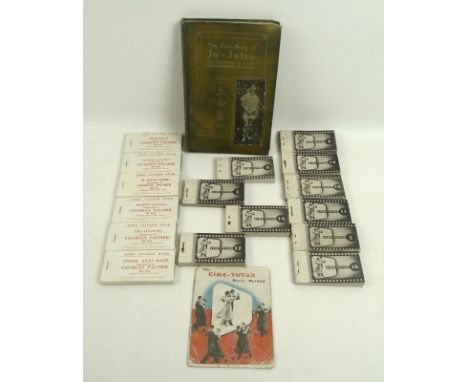 The Text-Book of Ju-Jutsu as practiced in Japan, by S. K. Uyenishi, second edition, cloth bound, 4to, together with six Judo 