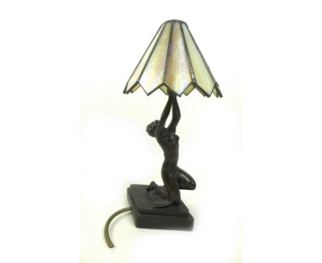 An Art Deco style figural lamp, formed as a bronzed woman semi nude and holding up the light, marked 'Oriole' to the base, wi