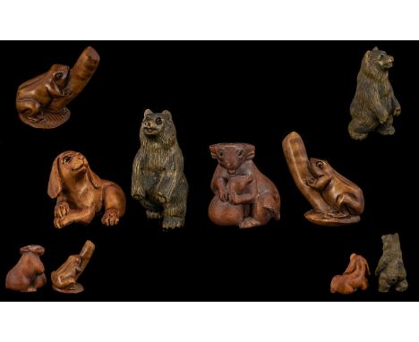 Four Japanese Boxwood Netsuke To Include A Bear, Dog, Frog And Water Buffalo Tallest 5cm. Three Signed To The Base. Please Se