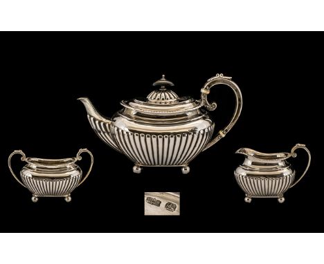 Bachelors - Sterling Silver Attractive 3 Piece Tea Set of Small Proportions, All with Half Fluted Bodies and Raised on Ball F