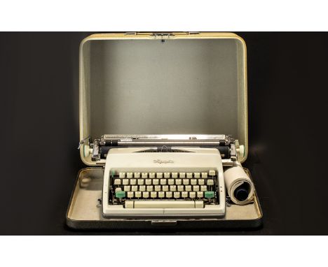 Olympia Typewriter.  Vintage typewriter in hard carry case, please see accompanying image.