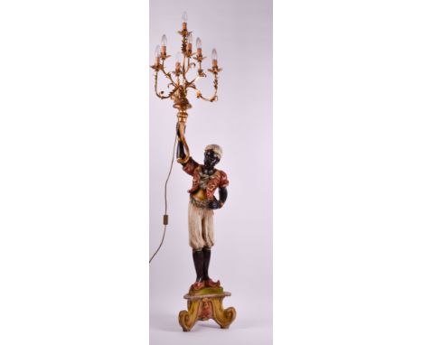   Dekorative figürliche Stehlampe  Holz, farbig staffiert, elektrifiziert, 7 flammig, H: 190 cm        Decorative figurative 