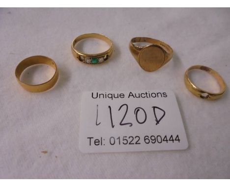 A 22ct gold ring 1.9g, an 18ct gold ring 4g, a 9ct gold ring 2.85g and an unmarked ring.