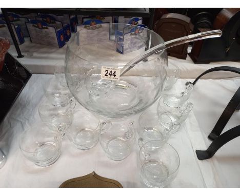 A punch bowl, ladle &amp; 11 glasses/cups