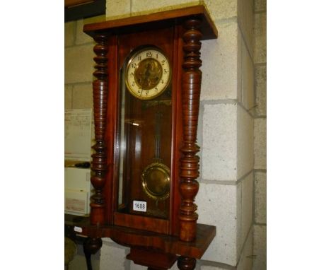 An early 20th century mahogany wall clock, COLLECT ONLY.
