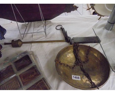 A set of brass beam scales.