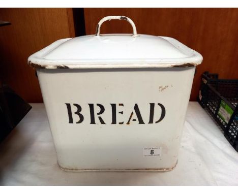 A vintage heavy enamel bread bin