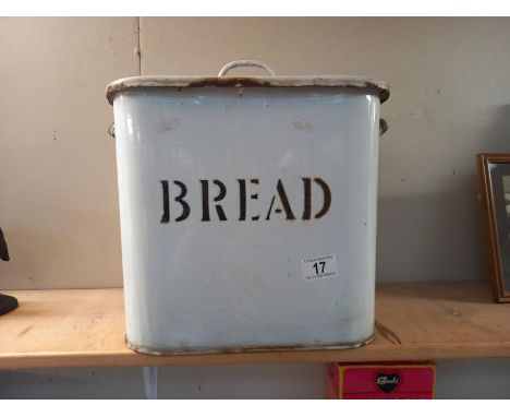 A vintage heavy enamel bread bin