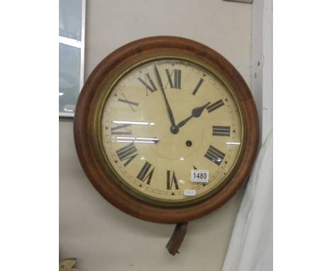 A circular wall clock.