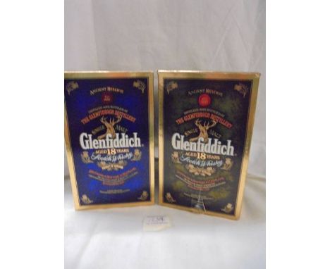 Two boxed Spode Glenfiddich 18 years old Scotch whisky decanters with contents. 