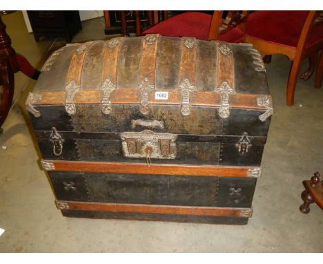 A large vintage dome top trunk. COLLECT ONLY.