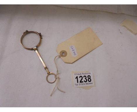 A Victorian folding Lorgnette.