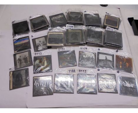 In excess of 100 black &amp; white and coloured magic lantern slides.