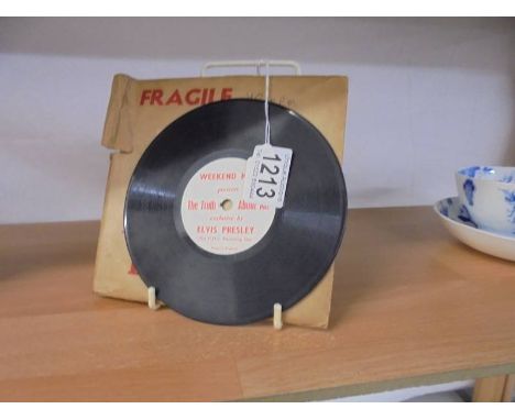 A rare 6" 78rpm Weekend Mail 'The Truth About Me' Elvis Presley record.