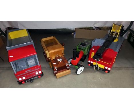 A painted wooden tipper truck (0.8ml - kit), A painted wooden traction engine and varnished tipper truck (0.35ml max- from ki