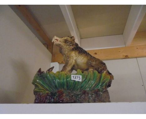 A large ceramic boar.Condition report;No visible damage. No makers mark. Height 41cm, 39cm x 25cm
