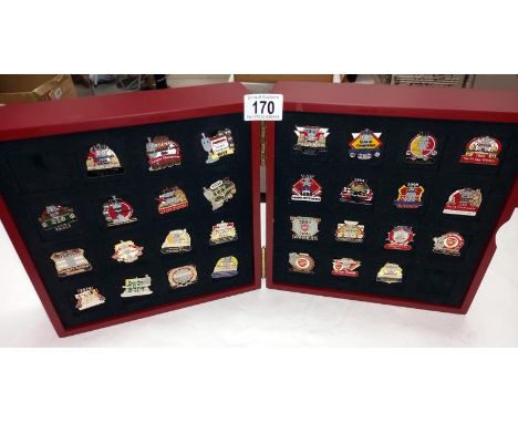 A cased set of Arsenal victory pins with certificates. 30 in total
