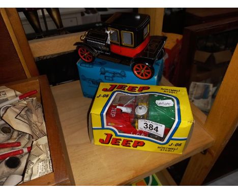 A boxed tin plate vintage style car &amp; fire engine jeep