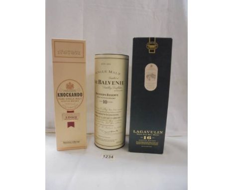 A boxed Lagavulin 16 year old Scotch whisky, A bottle of Balvenie single malt and a bottle of Knockando whisky. 