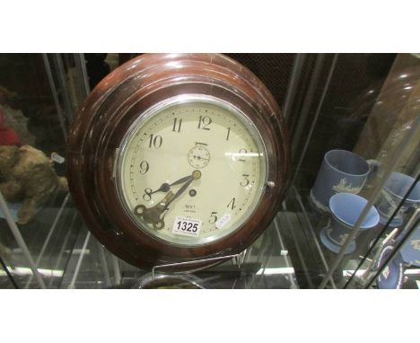 A Dent London circular wall clock.