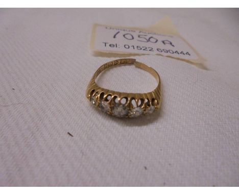 An 18ct gold ring set five diamonds, 3.3 grams, a/f.