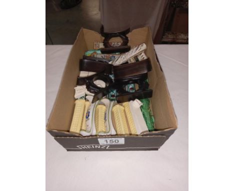A mixed lot of ceramic knife rests