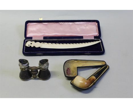 Cased meerschaum pipe, together with a pair of opera glasses and an early 20th Century African carved ivory letter opener, (3