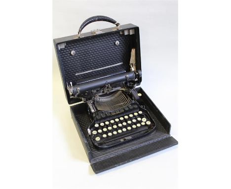 Corona Coronet folding typewriter in original carrying case