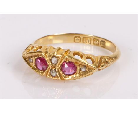 18 carat ruby and diamond, with two rubies and four diamonds, ring size M