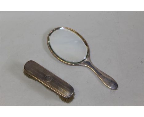 George V silver hand mirror and brush, London 1919, maker Charles & Richard Comyns, the engine turned backs with central init