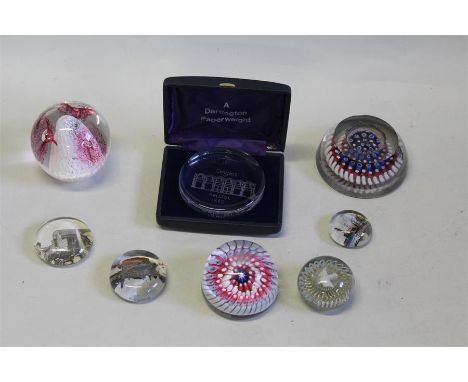 Eight glass paperweights, two millefiori examples, three architectural, a dove, Dartington cased, and a Jerpoint Irish exampl