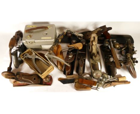 A collection of early 20th century and later carpenters hand tools, to include multi planes, chizels, drills, rebate planes, 