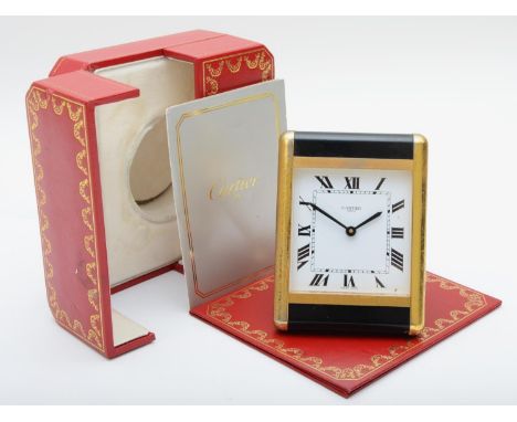 Les Must de Cartier travel quartz alarm clock, reference no. 7505, serial no. 01716, rectangular white dial with Roman numera