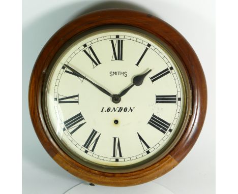 An early 20th century mahogany drop dial wall clock, the painted dial signed Smiths London, housing a manual wind movement. 3
