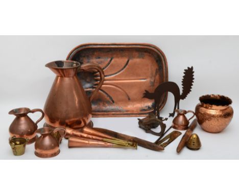 A collection of 19th century and later brass, copper and pewter wares, to include graduated copper measuring jugs with excise