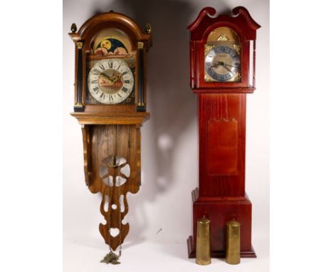 A mid 20th century Dutch wall clock, having moonphase with twin weight movement striking on bell, together with a mini longca