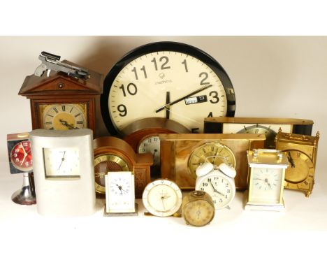 A collection of mid 20th century and later mantel clocks, anniversary clocks, wall clocks, and barometers, having manual and 