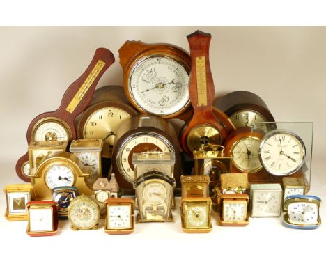 A collection of mid 20th century and later mantel clocks, anniversary clocks, wall clocks, and barometers, having manual and 