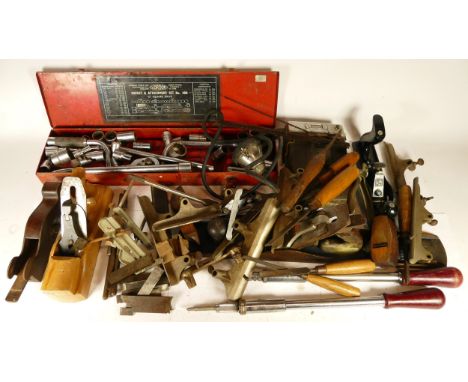 A collection of early 20th century and later carpenters hand tools, to include multi planes, chizels, drills, rebate planes, 