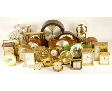 A collection of mid 20th century and later mantel clocks, anniversary clocks, wall clocks, and barometers, having manual and 