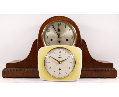 A 1950s oak cased Westminster chime mantel clock, having an eight day movement striking on four gongs, together with  a Jungh