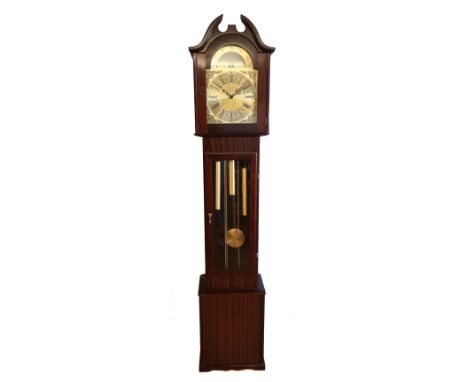 A 8 day longcase clock, moonphase movement striking on gongs, with triple chime, St. Michaels, Westminster and Whittingtons, 