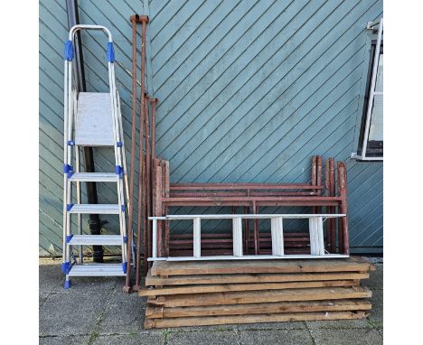 A metal scaffold tower with plank boards, a step ladder and a loft ladder, no brackets 